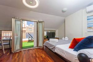 Fotografia z galérie ubytovania Precioso Ático con terraza centro Historico Malaga v destinácii Málaga + 10 fotografií