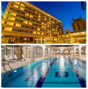 Πισίνα στο ή κοντά στο Hotel Aro Palace