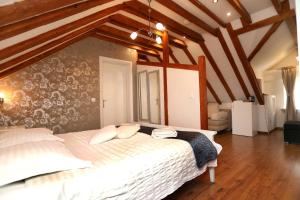 Postel nebo postele na pokoji v ubytování Villa Carrara