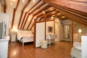 Postel nebo postele na pokoji v ubytování Villa Carrara