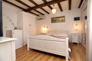 Postel nebo postele na pokoji v ubytování Villa Carrara