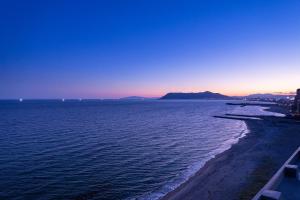 
a beach with a view of the ocean at Imagine Hotel & Resort in Hakodate
