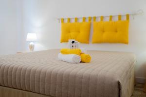 Postel nebo postele na pokoji v ubytování Hotel Soleo