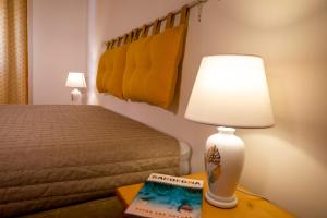Postel nebo postele na pokoji v ubytování Hotel Soleo