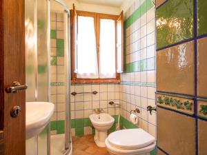 A bathroom at Holiday Home San Lorenzo-3 by Interhome