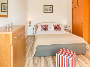 Postel nebo postele na pokoji v ubytování Apartment Klaudija by Interhome
