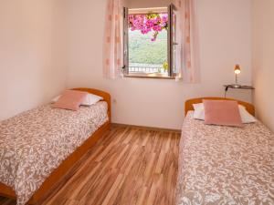 Postel nebo postele na pokoji v ubytování Apartment Klaudija by Interhome