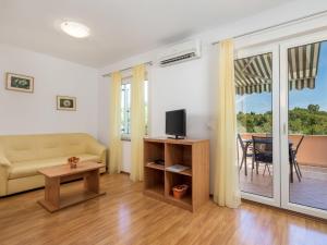 TV a/nebo společenská místnost v ubytování Apartment Glavotok by Interhome + 19 fotografií