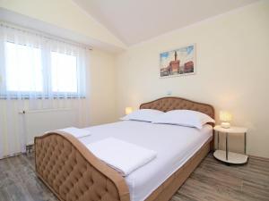 Postel nebo postele na pokoji v ubytování Apartment Marko-2 by Interhome