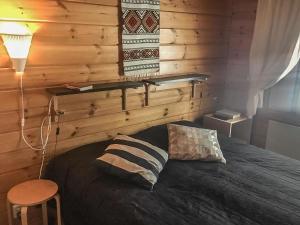 Postel nebo postele na pokoji v ubytování Holiday Home Lomaylläs b26 -palovaarankaarre 8 a by Interhome