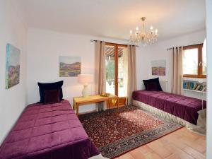 En eller flere senger på et rom på Apartment Villa Vivendi - VEN100 by Interhome