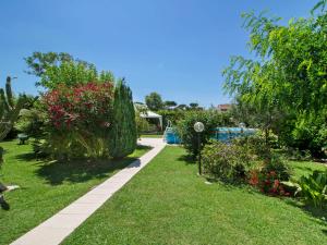 A garden outside Holiday Home Casina del Sole by Interhome