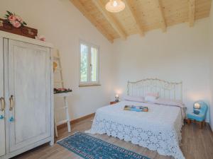A bed or beds in a room at Holiday Home Casina del Sole by Interhome