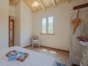 A bed or beds in a room at Holiday Home Casina del Sole by Interhome