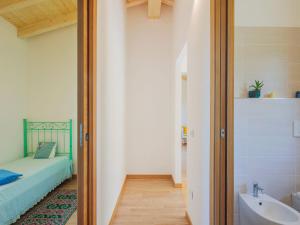 A bed or beds in a room at Holiday Home Casina del Sole by Interhome
