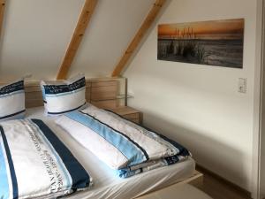 Ένα ή περισσότερα κρεβάτια σε δωμάτιο στο Holiday Home Kleine Möwe by Interhome +15 φωτογραφίες
