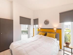 Postel nebo postele na pokoji v ubytování Holiday Home Vakantiehuis Ruisweg 89 by Interhome