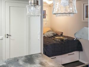 Ένα ή περισσότερα κρεβάτια σε δωμάτιο στο Holiday Home Piitterin saunatupa by Interhome