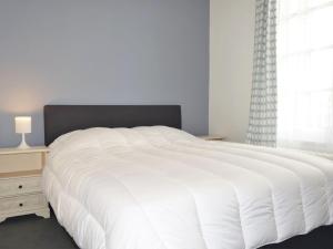 Ένα ή περισσότερα κρεβάτια σε δωμάτιο στο Apartment Ker Louis by Interhome