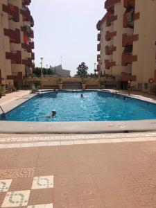 a swimming pool in the middle of a building at Maravillosa Cala in Calahonda