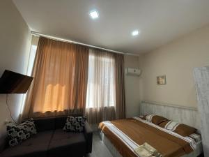 Voodi või voodid majutusasutuse Fazis Hotel toas