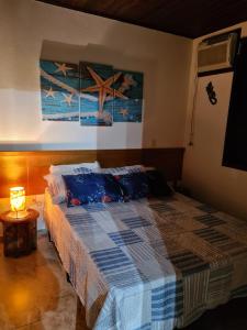 Voodi või voodid majutusasutuse Flat 25 SUN HOUSE Maresias toas +18 fotot