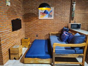 Televiisor ja/või meelelahutuskeskus majutusasutuses Flat 25 SUN HOUSE Maresias