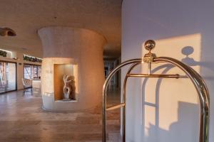 a room with a statue of a deer in a building at Zahara Beach & Spa by QHotels - Adults Recommended in Zahara de los Atunes