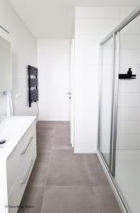 Kúpeľňa v ubytovaní Friendship Suite + 15 fotografií