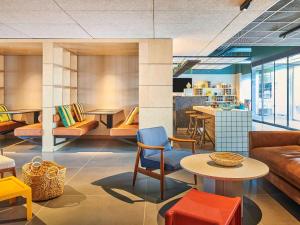Coin salon dans l'établissement Greet Hotel Paris porte de la Chapelle - Aréna