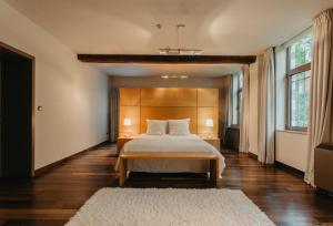 
Cama ou camas em um quarto em Hotel Le Val-Fayt
