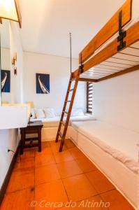 a room with a bunk bed and a ladder at Cerca do Altinho in Vila Nova de Milfontes +7 photos
