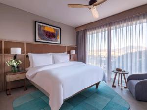 The Bodrum Hotel Yalikavak - MGallery Collection客房内的一张或多张床位