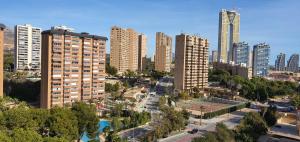 an aerial view of a city with tall buildings at COBLANCA 20 - Fincas Arena in Benidorm