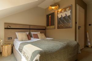 Ένα ή περισσότερα κρεβάτια σε δωμάτιο στο Rybitwa - nadlatuje wypoczynek! +50 φωτογραφίες