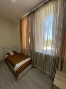 Voodi või voodid majutusasutuse Fazis Hotel toas