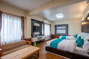 Tempat tidur dalam kamar di Hotel Himalayan Glacier