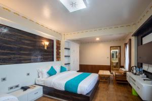 Postel nebo postele na pokoji v ubytování Hotel Himalayan Glacier + 37 fotografií