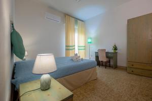 Postel nebo postele na pokoji v ubytování Hotel Soleo