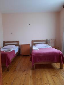 Letto o letti in una camera di Kera Guest House