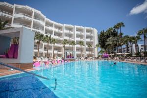 a large swimming pool in front of a hotel at Servatur Don Miguel - Adults Only in Playa del Ingles