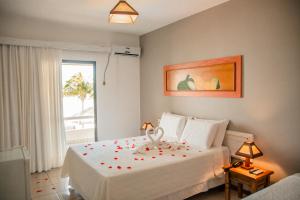 Postel nebo postele na pokoji v ubytování Cahy Praia Hotel + 30 fotografií