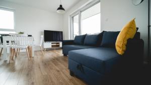 TV a/nebo společenská místnost v ubytování Apartament Marbud przy Aquaparku Reda