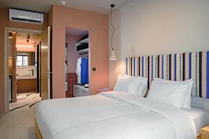 Pavo Art Hotel客房内的一张或多张床位