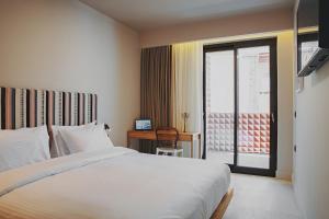 Pavo Art Hotel客房内的一张或多张床位