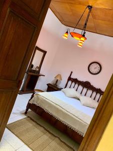 Un pat sau paturi într-o cameră la Casa Grande