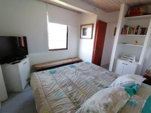 Postel nebo postele na pokoji v ubytování Tunquen Campomar Quincho y Piscina