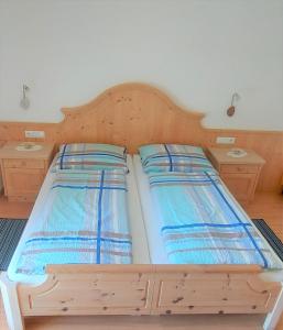 Postel nebo postele na pokoji v ubytování B&B Gasthaus Lieg