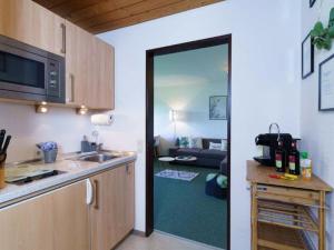 Kuchyň nebo kuchyňský kout v ubytování Panorama Seeblick