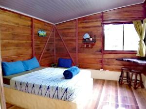 Postel nebo postele na pokoji v ubytování Cecropia Ecolodge
